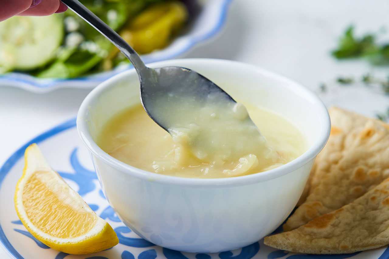 Cup of Homemade Chicken Lemon Rice Soup (Avgolemono)